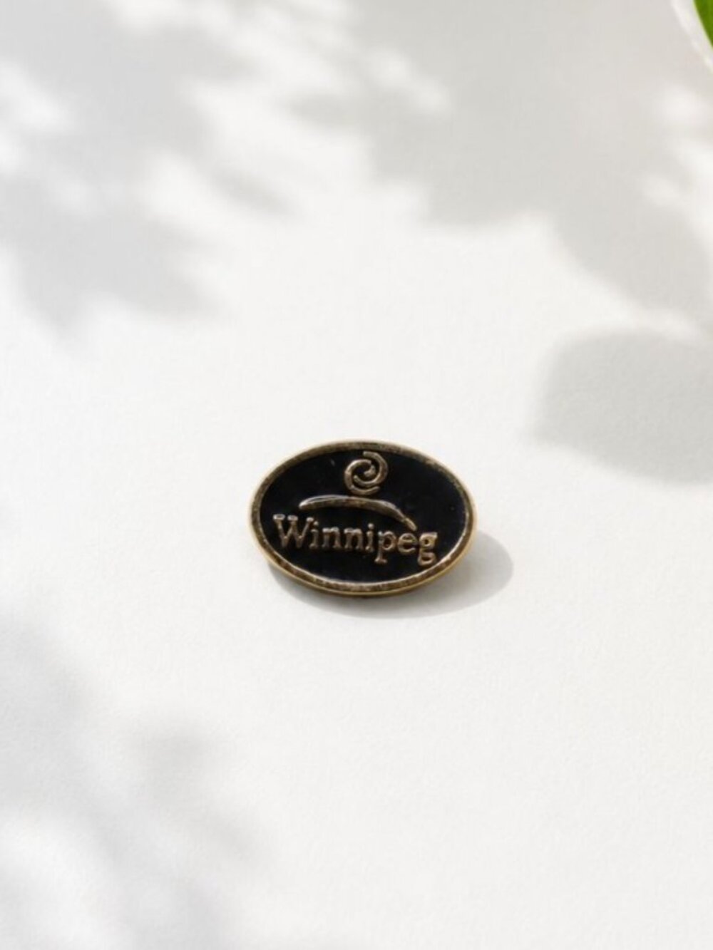 Vintage Winnipeg Souvenir Lapel Pin With Black Enamel & Gold Finish Oval Shape C